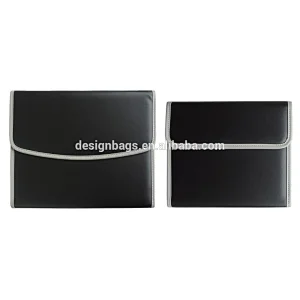 Expanding travel document organizer file folder with magnetic snap button