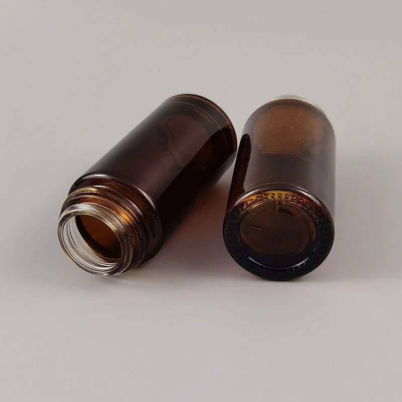 hot sell 50ml amber browm glass roller bottle roll-on fragrance essential oil vial stainless steel black cap perfume
