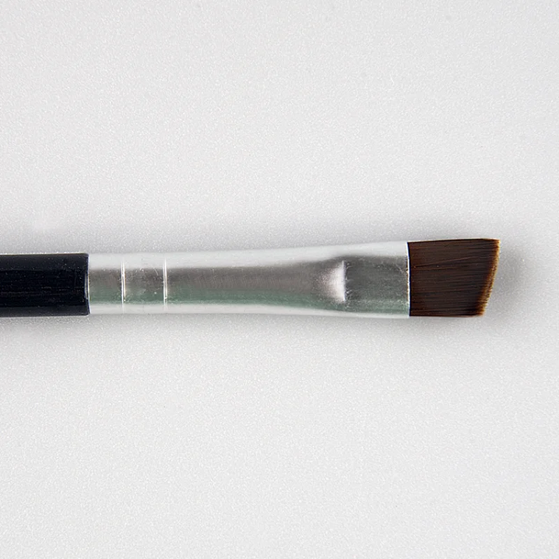 Eyebrow brush
