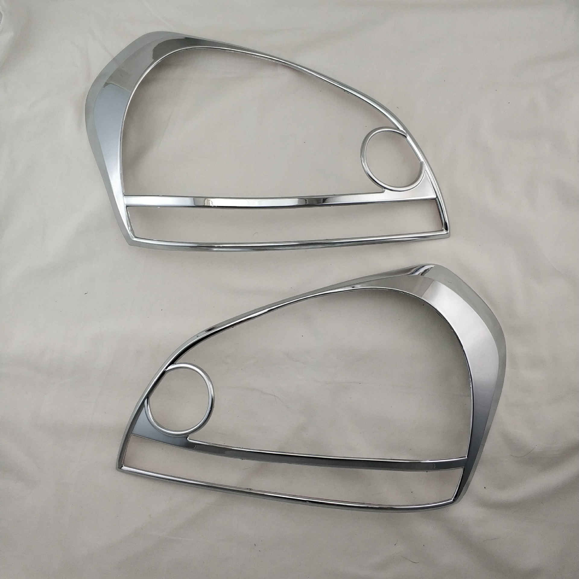 TUCSON 2008 CHROME HEAD LIGHT COVER