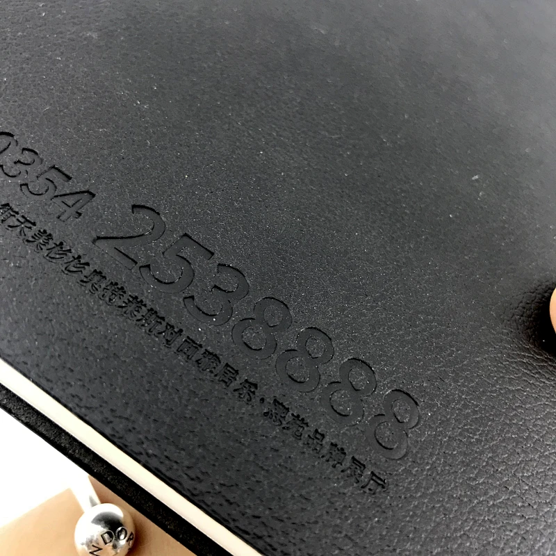 Customized design embossed logo a5 PU leather notebook