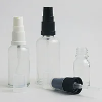 Empty Travel Clear 100ml 50ml 30ml 20ml 15ml 10ml 5ml glass essential oil bottle with pump 1oz glass dispenser bottle