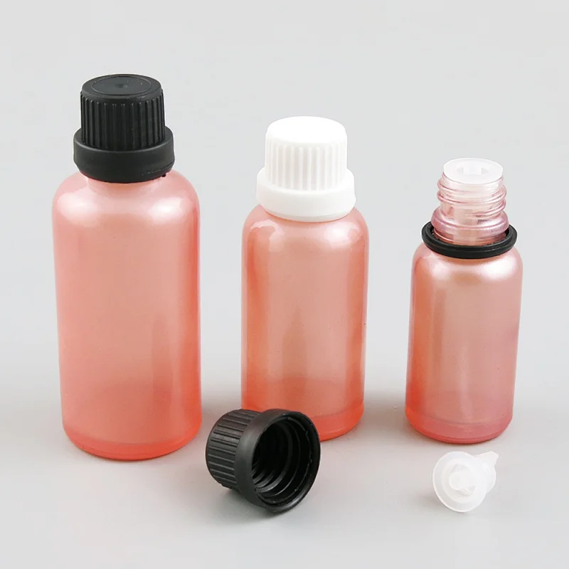 5ml 10ml 15ml 20ml 30ml 50ml 100ml pink glass essential oil bottles vial container with orifice reducers black white tamper evident caps