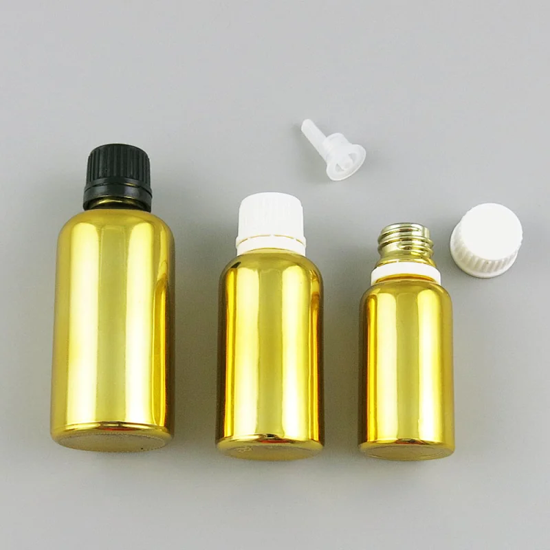 5ml 10ml 15ml 20ml 30ml 50ml 100ml gold glass essential oil bottles with orifice reducers and black white tamper evident caps