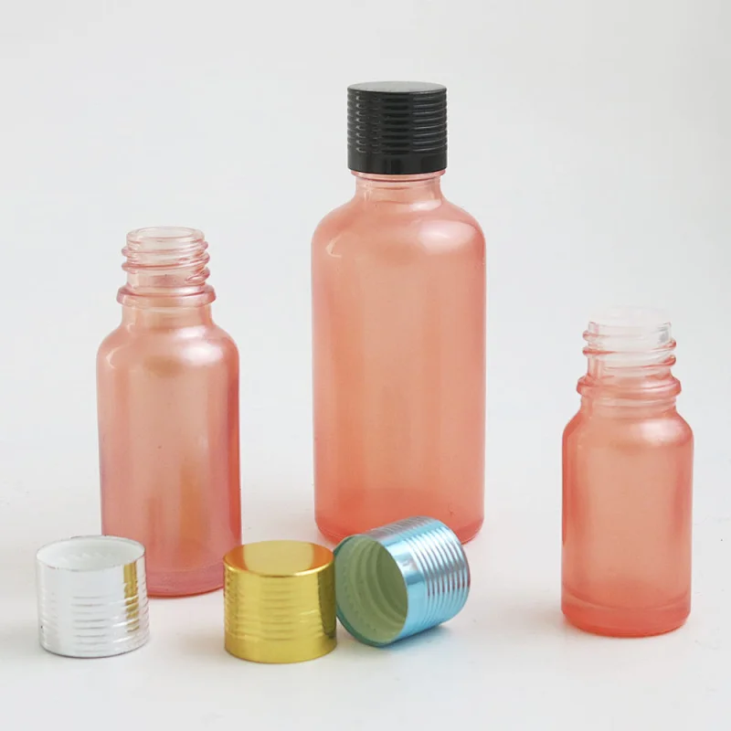 Pink glass essential oil bottles containers packaging with reducer aluminum lids 100ml 50ml 30ml 20ml 15ml 10ml 5ml