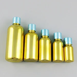 Gold glass essential oil bottles containers packaging with reducer aluminum lids 100ml 50ml 30ml 20ml 15ml 10ml 5ml