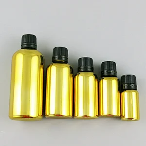 5ml 10ml 15ml 20ml 30ml 50ml 100ml gold glass essential oil bottles with orifice reducers and black white tamper evident caps