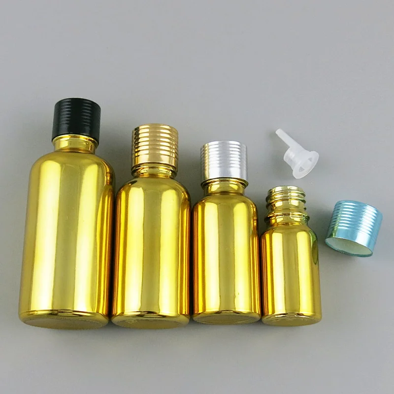 Gold glass essential oil bottles containers packaging with reducer aluminum lids 100ml 50ml 30ml 20ml 15ml 10ml 5ml