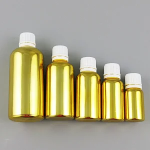 5ml 10ml 15ml 20ml 30ml 50ml 100ml gold glass essential oil bottles with orifice reducers and black white tamper evident caps