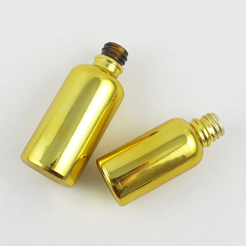 Gold glass essential oil bottles containers packaging with reducer aluminum lids 100ml 50ml 30ml 20ml 15ml 10ml 5ml