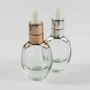 Refillable 30ml clear glass essential oil bottle with silver amber dropper Glass essential oil container