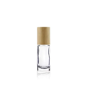 wholesale 5ml 10ml Refillable Bamboo Roll On Bottle Essential Oil Clear Glass Stainless Steel Roller Bottle With Bamboo Cap