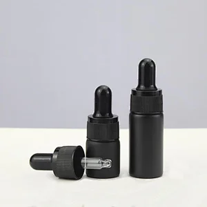 Hot Sale 5mL 10mL Empty Essential Oil Bottle Black And White Matte Glass Dropper Bottle For Perfume Essential Oil With Pipette