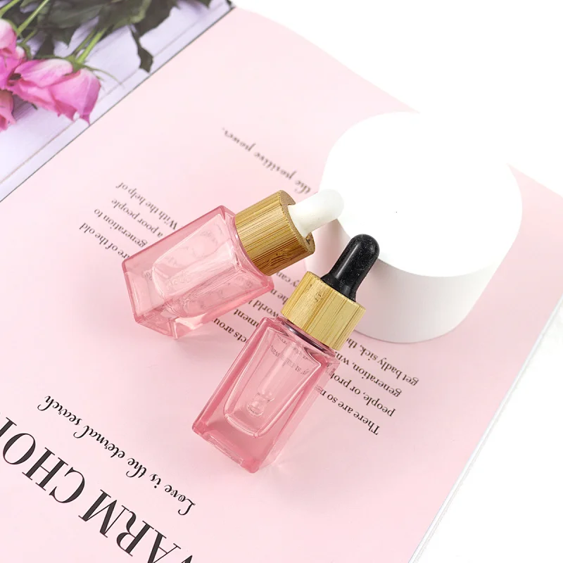 2022 New Trends Wholesale Cosmetic Package Pink Glass Bottle Dropper Square Shape Clear 10mL Glass Bottle With Bamboo Cap