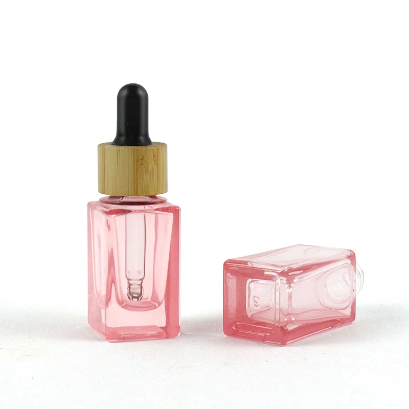 2022 New Trends Wholesale Cosmetic Package Pink Glass Bottle Dropper Square Shape Clear 10mL Glass Bottle With Bamboo Cap