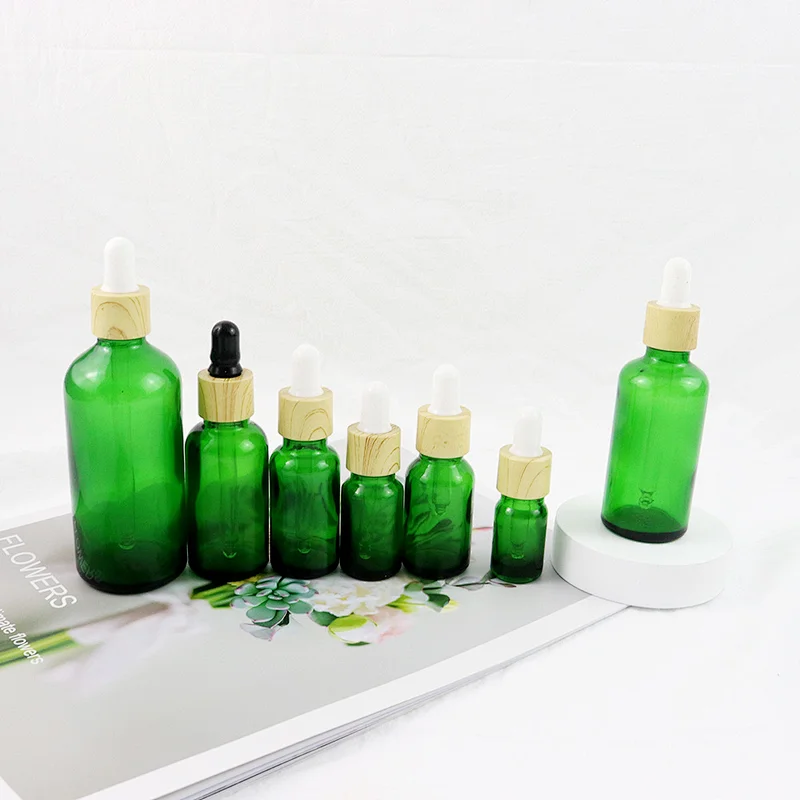 Eco Friendly Essential Oil 5ml 10ml 15ml 20ml 30ml 50ml 100ml Green Clear Glass Dropper Bottle With Bamboo Lid