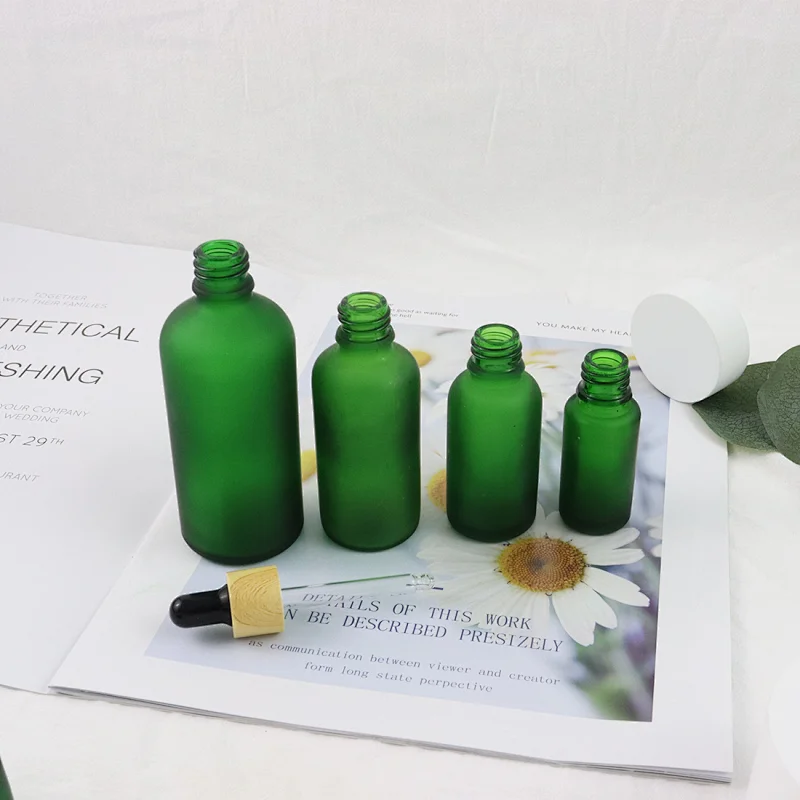 Luxury Boston Round Glass Essential Oil Dropper Bottle Green Frosted Glass Dropper Bottle With Bamboo Cap