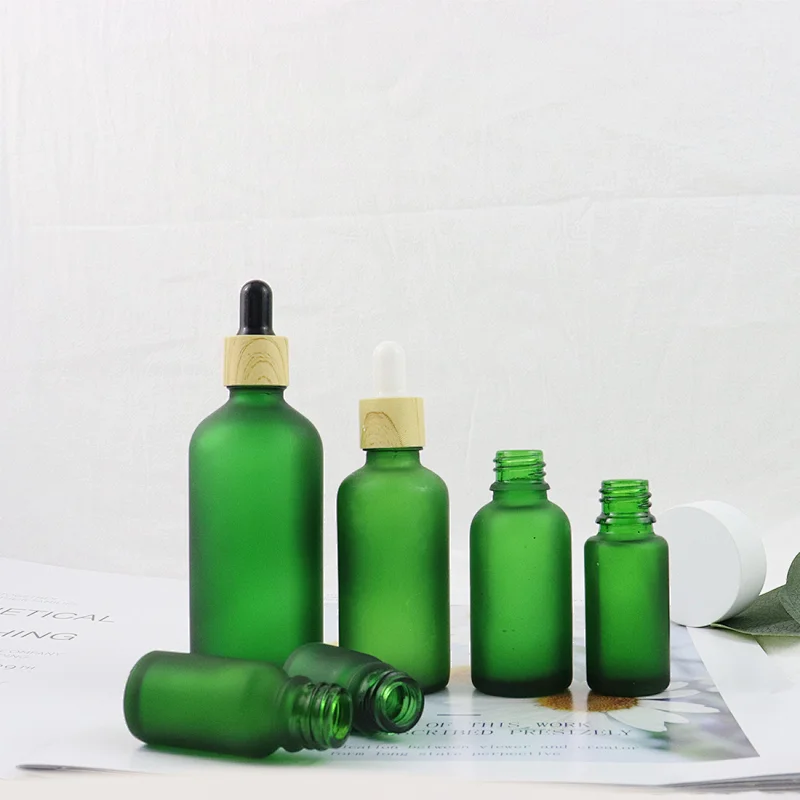 Luxury Boston Round Glass Essential Oil Dropper Bottle Green Frosted Glass Dropper Bottle With Bamboo Cap
