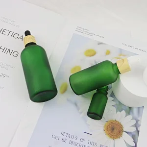 Luxury Boston Round Glass Essential Oil Dropper Bottle Green Frosted Glass Dropper Bottle With Bamboo Cap