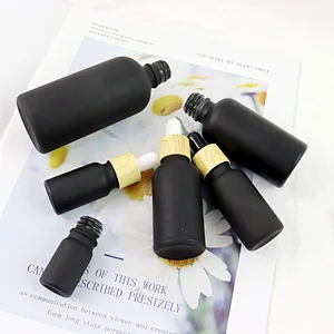 Wholesale 5mL 10mL 15mL 20mL 30mL 50mL 100mL Matte Frosted Black Dropper Bottles With Bamboo Cap Calibrated Glass Pipette