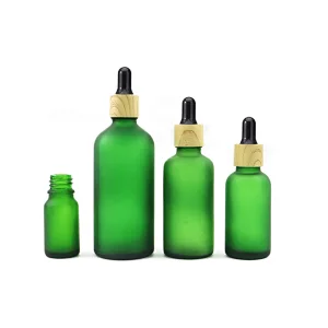 Luxury Boston Round Glass Essential Oil Dropper Bottle Green Frosted Glass Dropper Bottle With Bamboo Cap