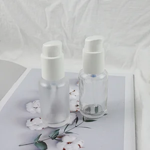 Recyclable Empty 50ml Round Shape Flat Round Shoulders Clear Glass Body Lotion Pump Bottle