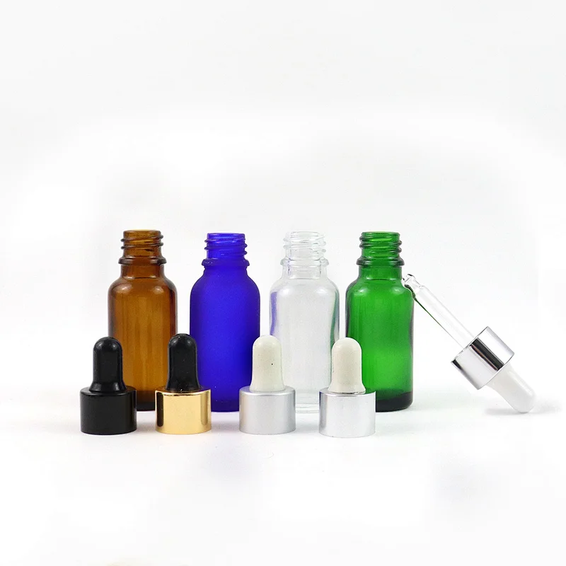 Wholesale Factory Direct Facial Essential Oil Glass Bottle 20mL Green Clear Blue Amber Dropper Bottle Cosmetic Black White Lid