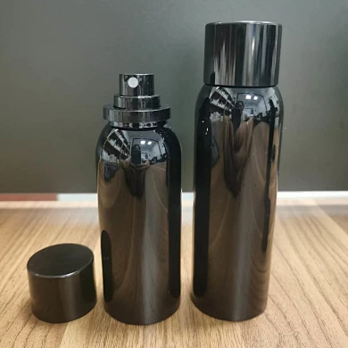 glass spray bottle with black plastic pump head