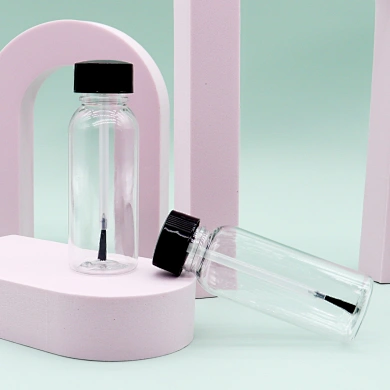 clear bottle with brush