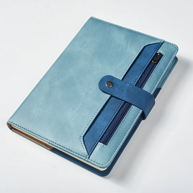 A5 notebook with zipper and belt closure
