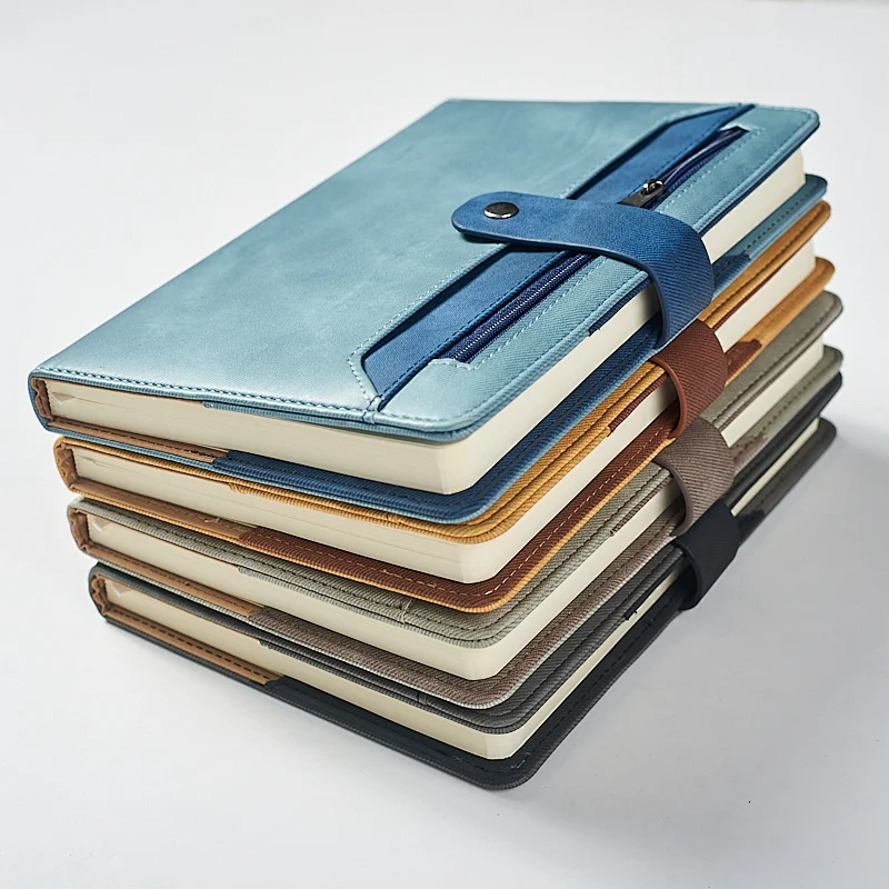 A5 notebook with zipper and belt closure