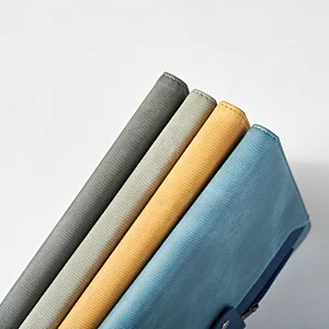 A5 notebook with zipper and belt closure