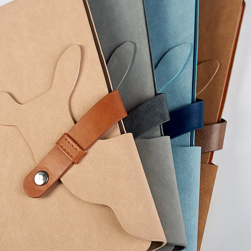 A5 shaped belt closure notebook