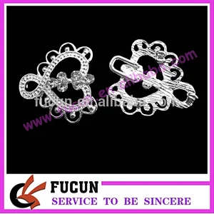 Guangzhou cheap rhinestone diamante embellishments brooch for wedding invitation in bulk