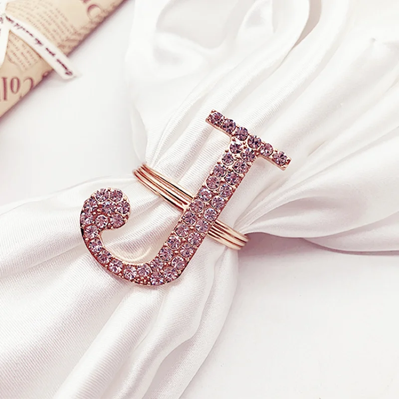 Latest design plating gold rhinestone napkin ring crystal diamond napkin ring for Wedding table centerpieces