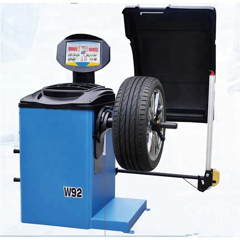Tire balancing automatic wheel balancer