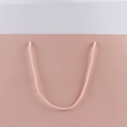 custom printed logo high quality pink rose luxury drawstring paper gift bag for garment