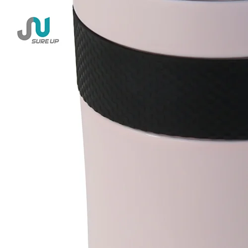detail of stainless steel thermos mug