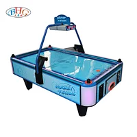 coin operated air hockey table game