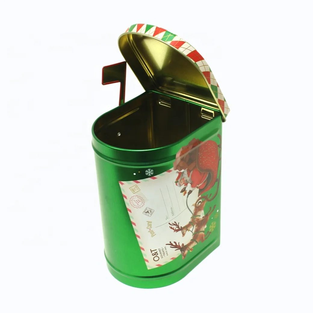 During Christmas season, my family loves to decorate our home with festive decor, including a mailbox tin. The mailbox tin is designed with a classic red and green color scheme, and it's the perfect size to hold holiday cards and treats.