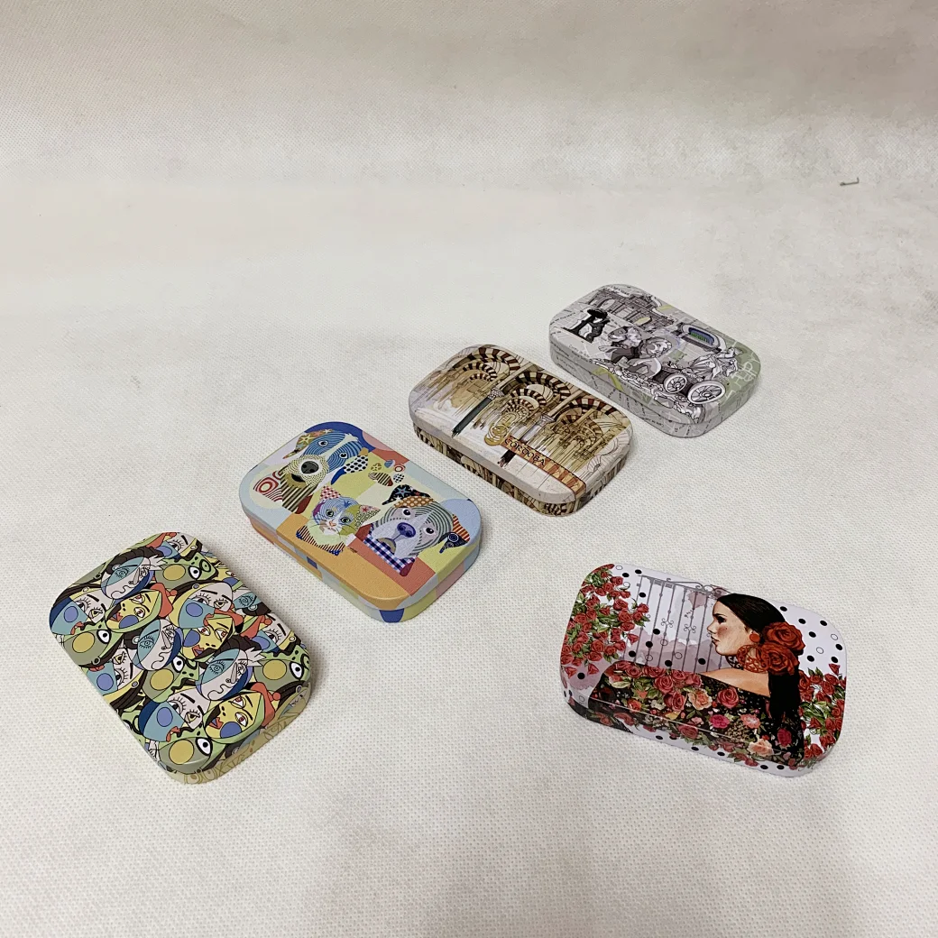 Our mini tin cases are perfect for storing small items like jewelry, coins, and mints. Durable and available in a variety of designs.