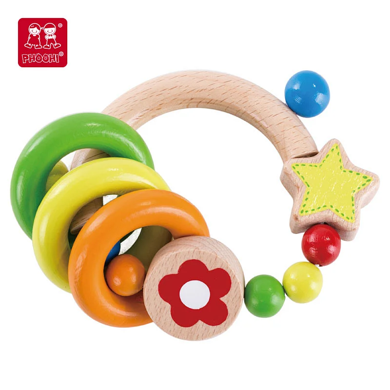 wooden clutching rattle