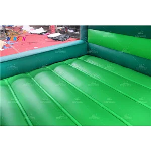 Forest jumping house with slide
