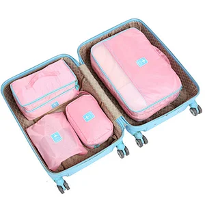 Best Selling Travel Accessories- 4 Set Packing Cubes - travel packing organizer bag with Laundry Bag