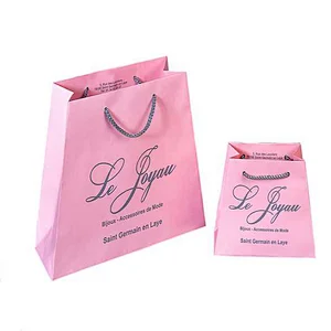 Production Customized wholesale cheap white artpaperboard shopping paper bag
