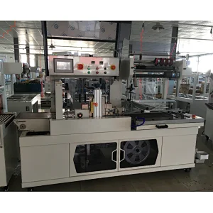 Automatic side sealing machine and heat shrink wrapping machine