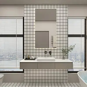 Idée de conception de salle de bain en carreaux de grille blanche