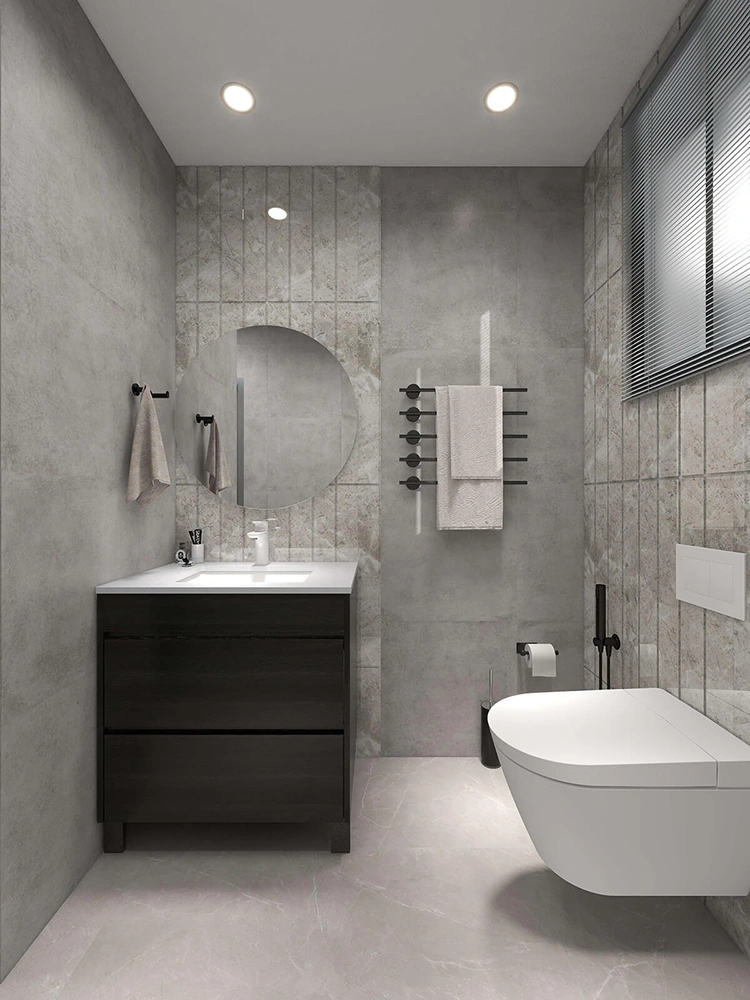 A contemporary bathroom with a gray color scheme and modern fixtures