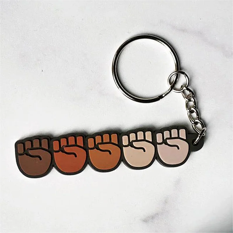 Stand Together Raised Fists rubber Keychain