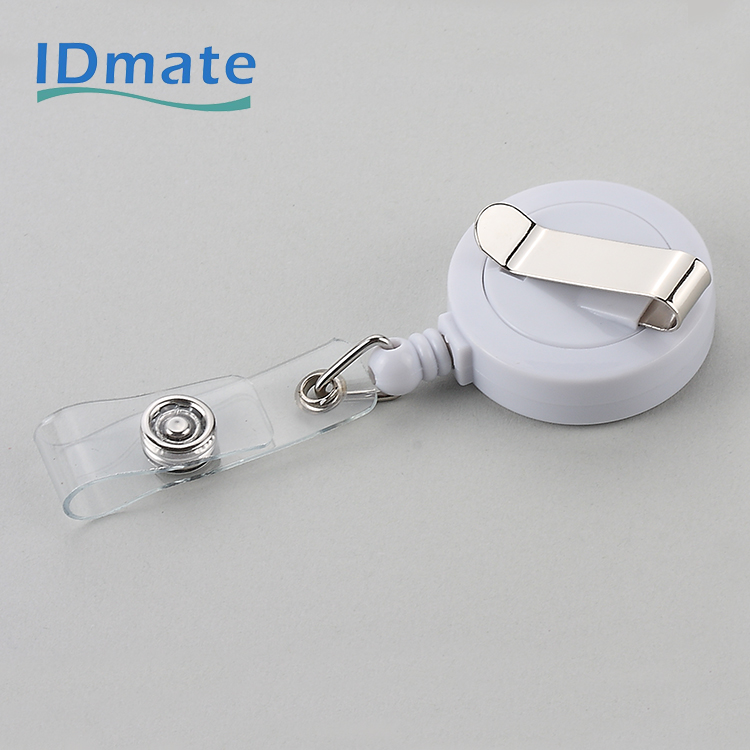 Badge reel with rotating clip